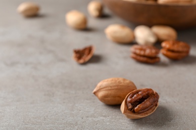 Pecan nuts on table, space for text