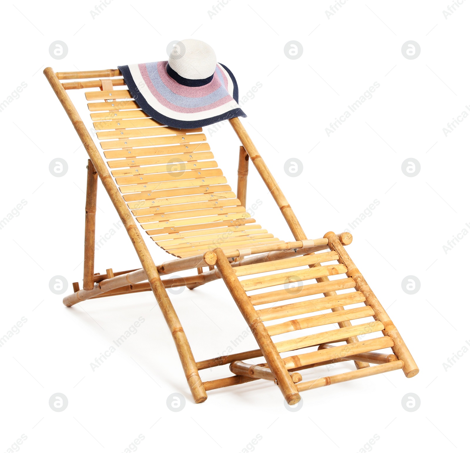 Photo of Empty wooden sunbed with hat on white background. Beach accessories