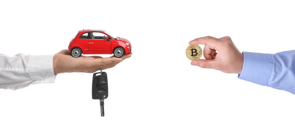 Image of Bitcoin exchange. Man using cryptocurrency to buy car. Seller with key holding miniature automobile model and buyer with bitcoin on white background, closeup