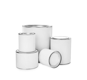 Photo of Paint cans and roller on white background