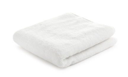 Photo of Folded clean soft towel on white background