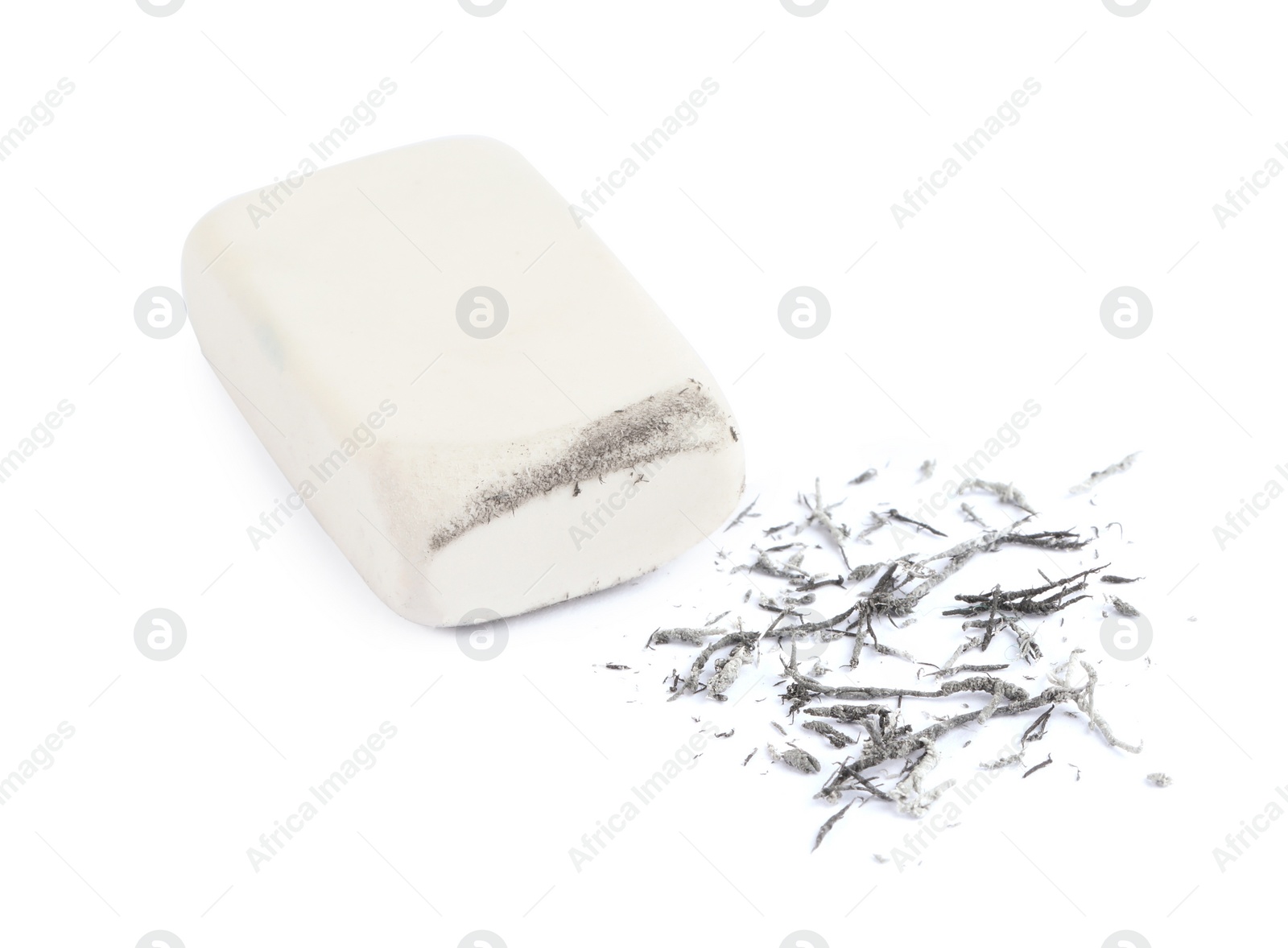 Photo of Eraser and grey crumbs on white background