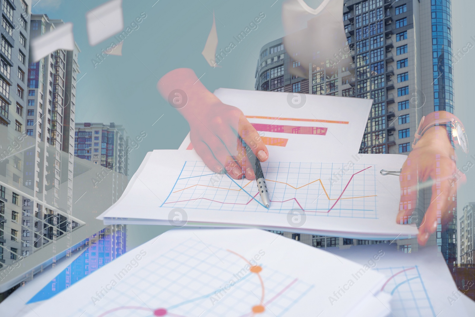 Image of Double exposure of businesswoman working with documents and cityscape