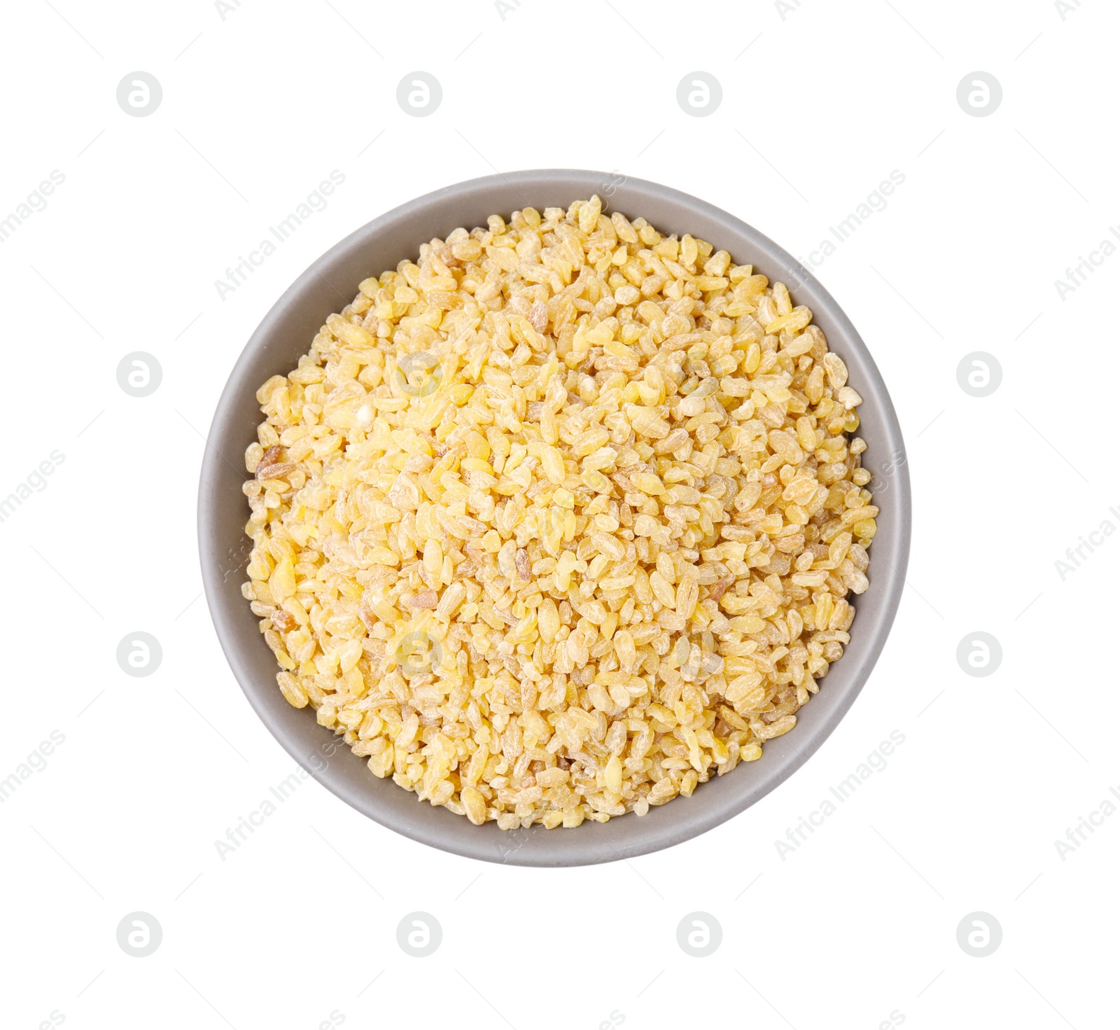 Photo of Raw bulgur in bowl isolated on white, top view