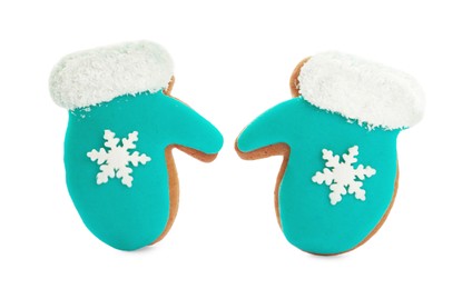Christmas cookies in shape of mittens on white background