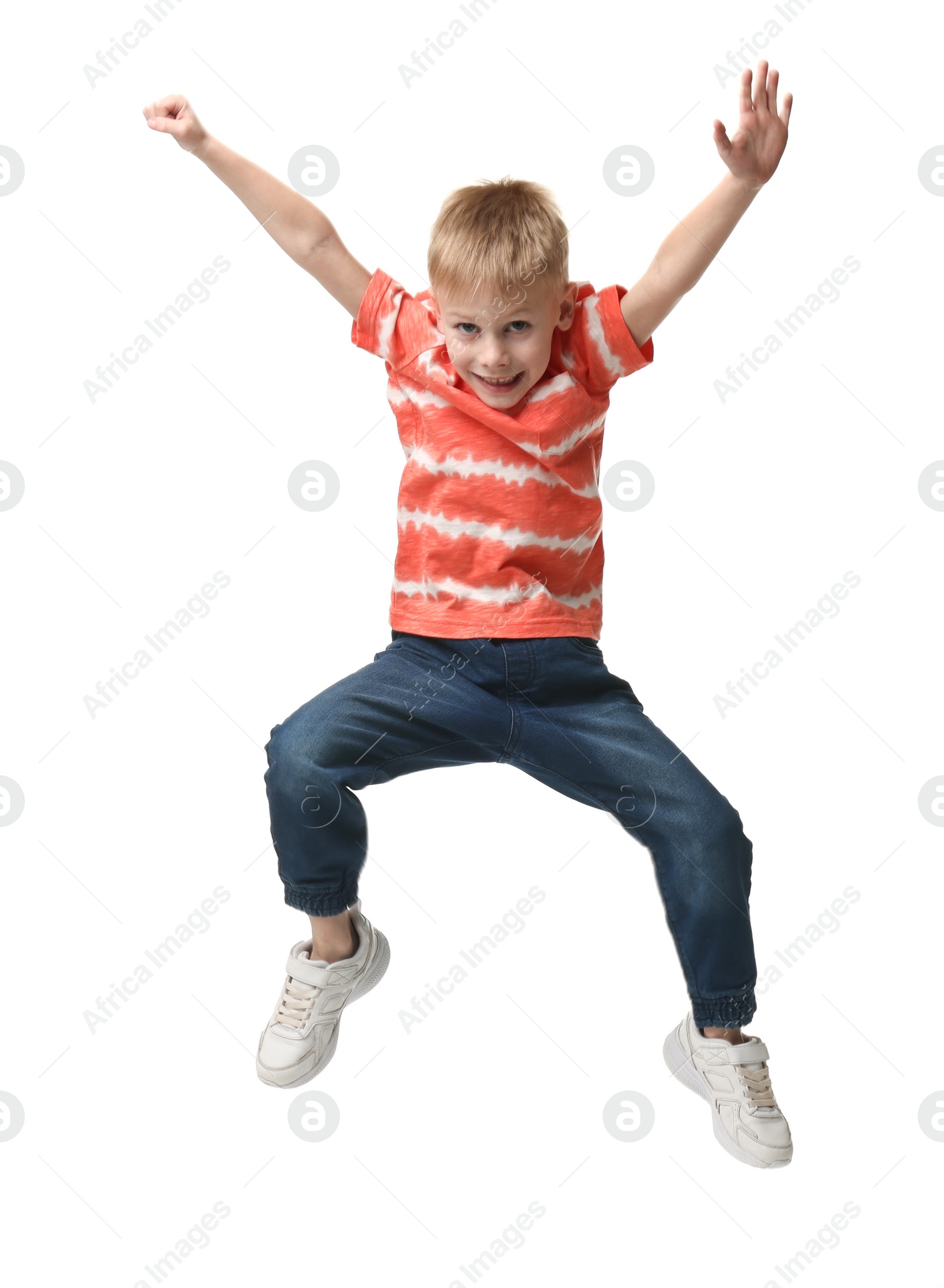 Photo of Happy little boy dancing on white background