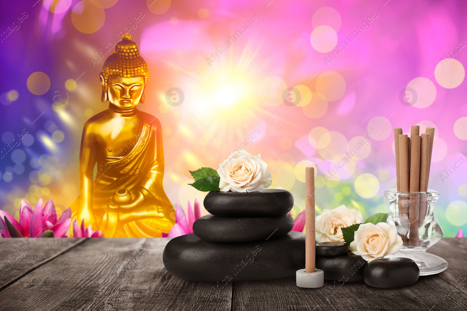 Image of Composition with incense sticks on wooden table and Buddha figure on background