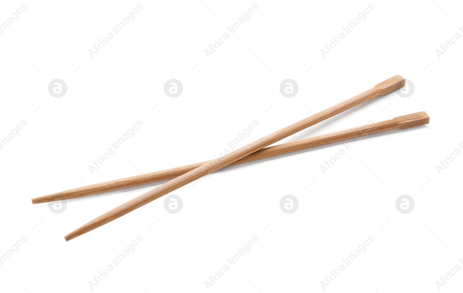 Photo of Chopsticks made of bamboo on white background