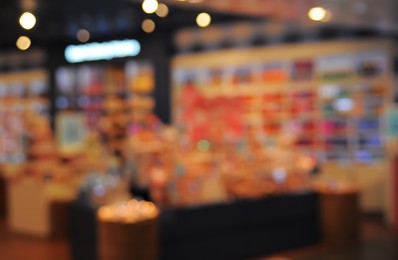 Photo of Blurred view of shopping mall interior. Bokeh effect