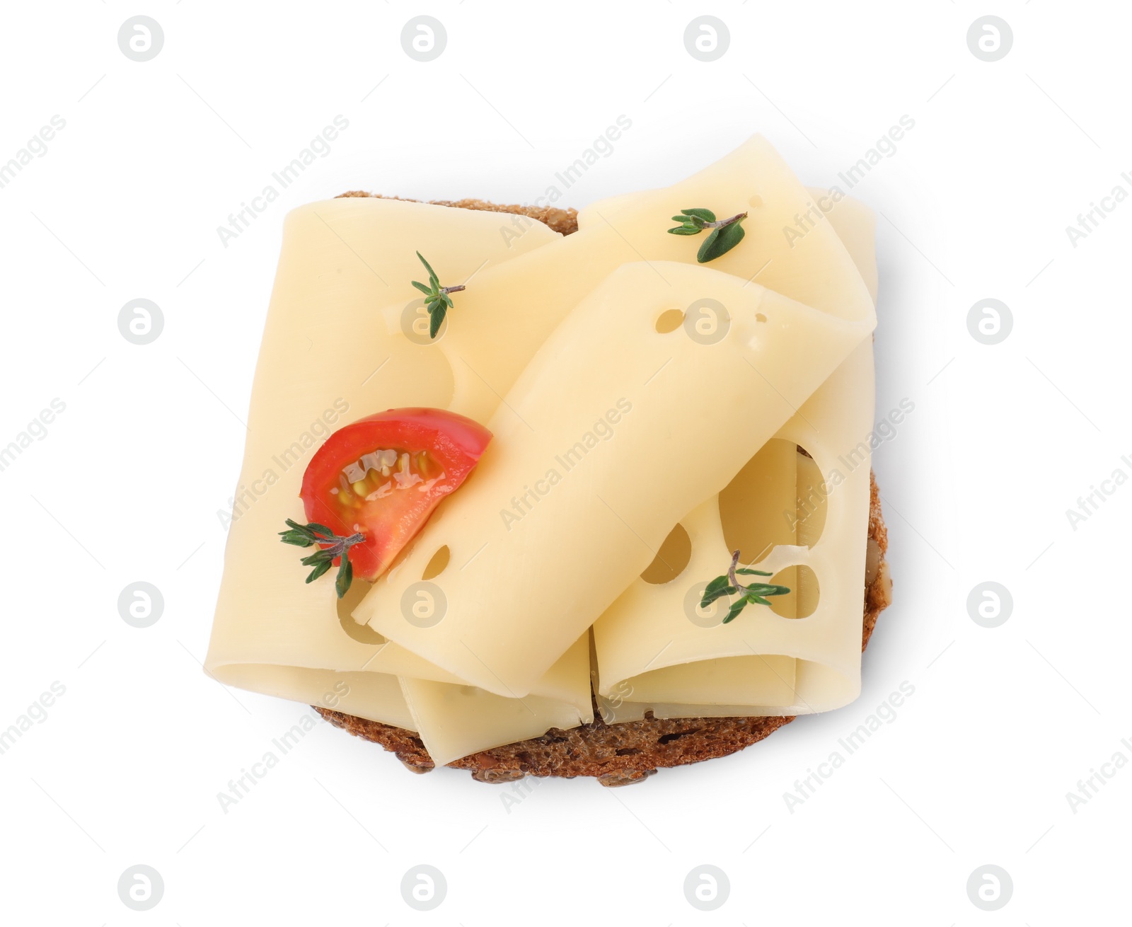 Photo of Tasty sandwich with slices of fresh cheese, tomato and thyme isolated on white, top view