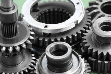 Photo of Many different stainless steel gears, closeup view