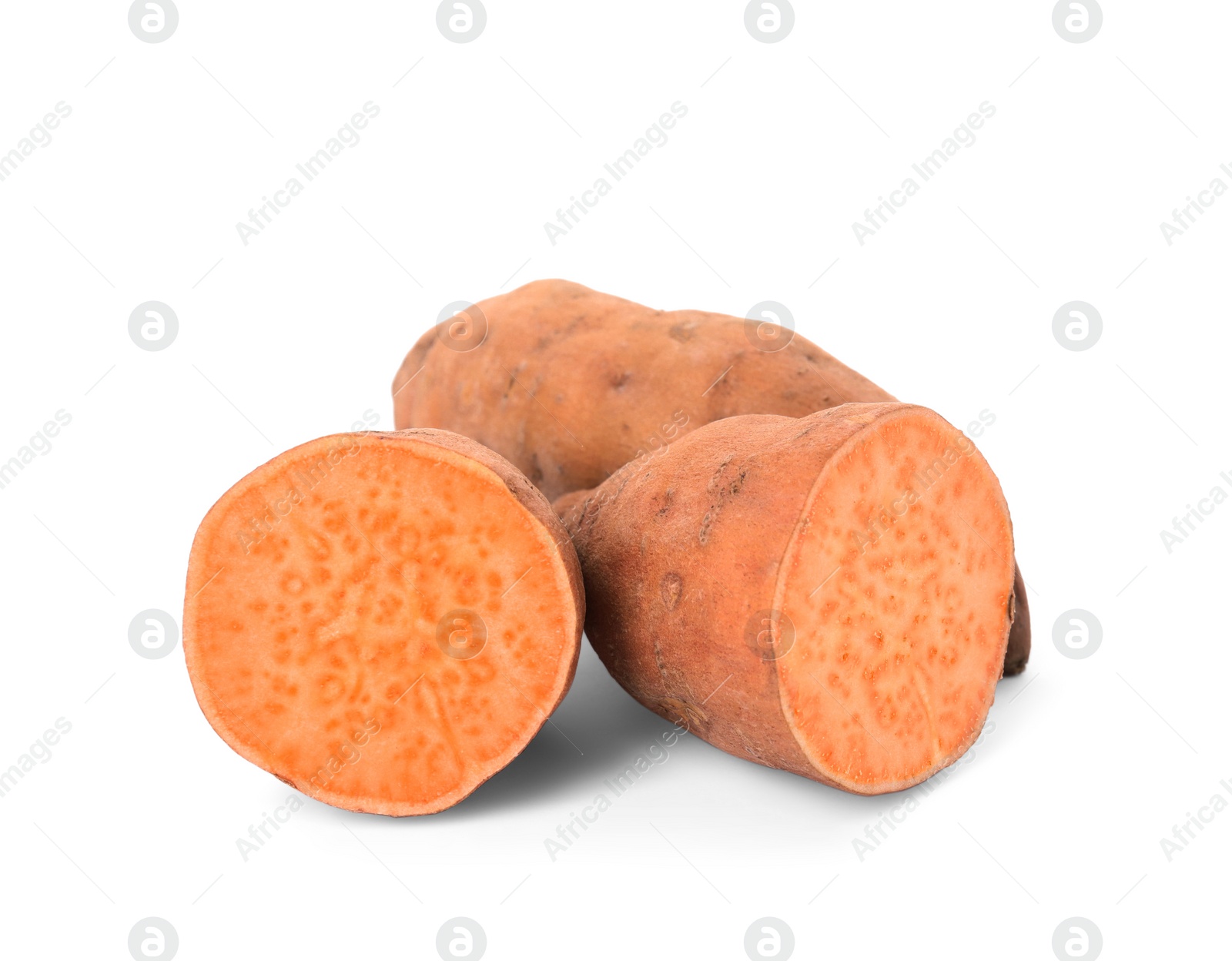 Photo of Whole and cut ripe sweet potatoes on white background