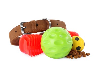 Photo of Pet toys, food and collar on white background