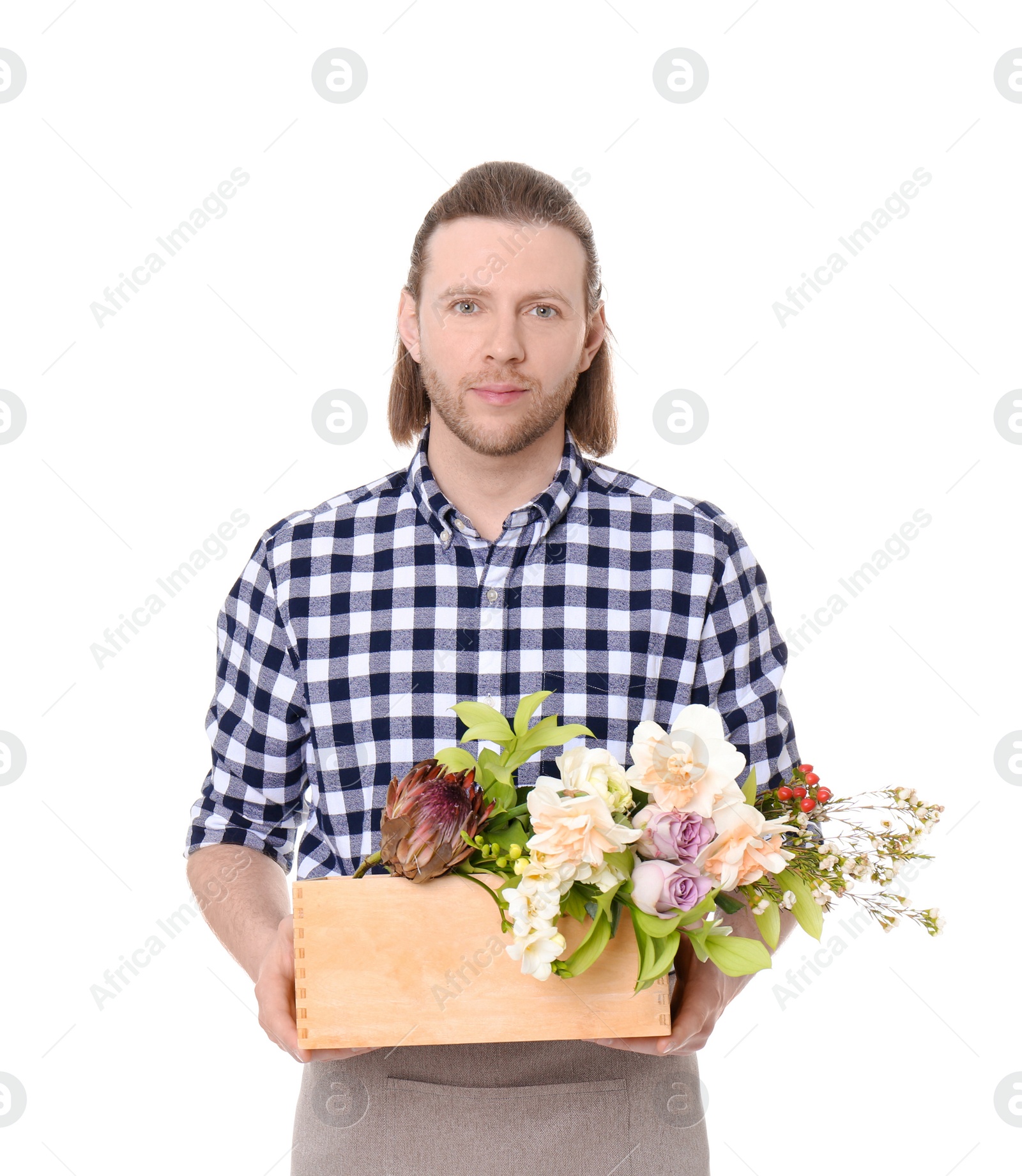 Photo of Male florist holding basket with flowers on white background