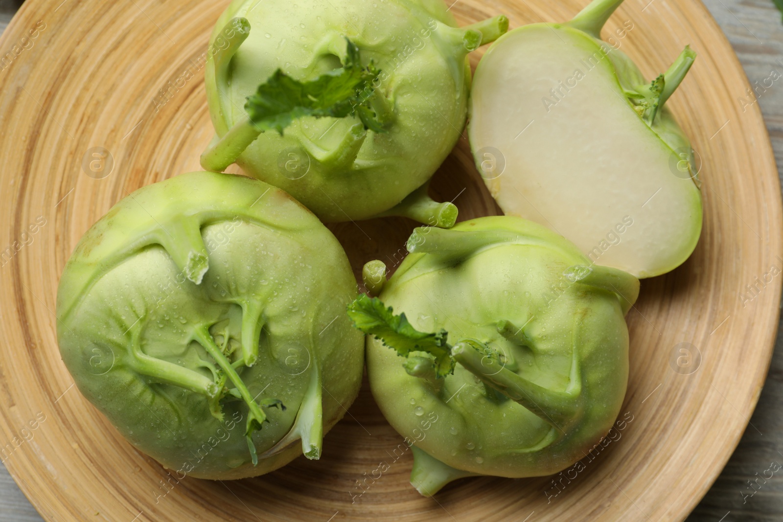 Photo of Ripe kohlrabi plants on plate, closeup view