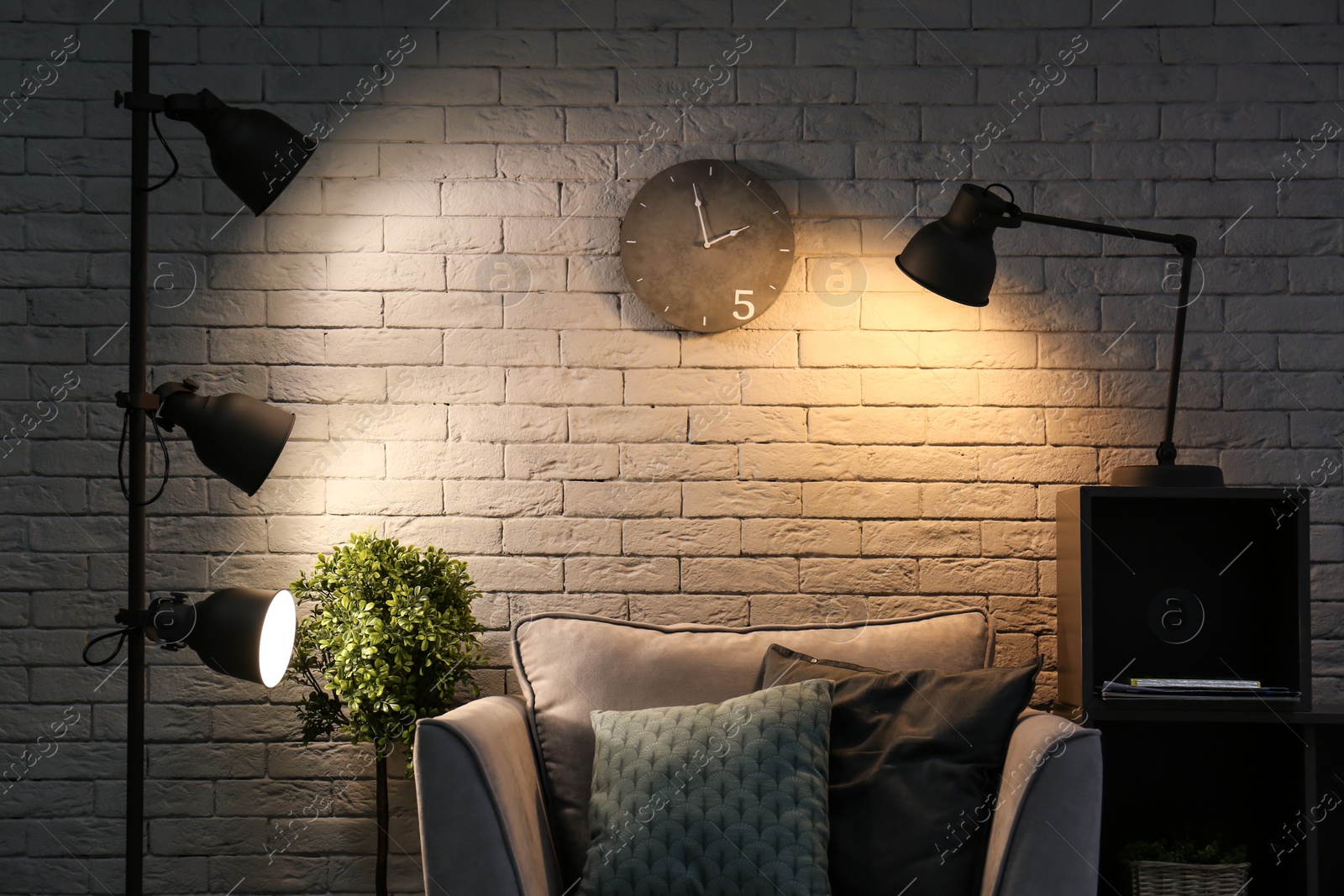 Photo of Interior of living room with modern lamps