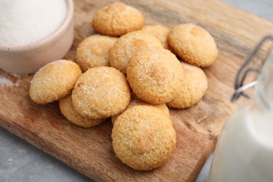 Photo of Tasty fresh sugar cookies on grey table, closeup