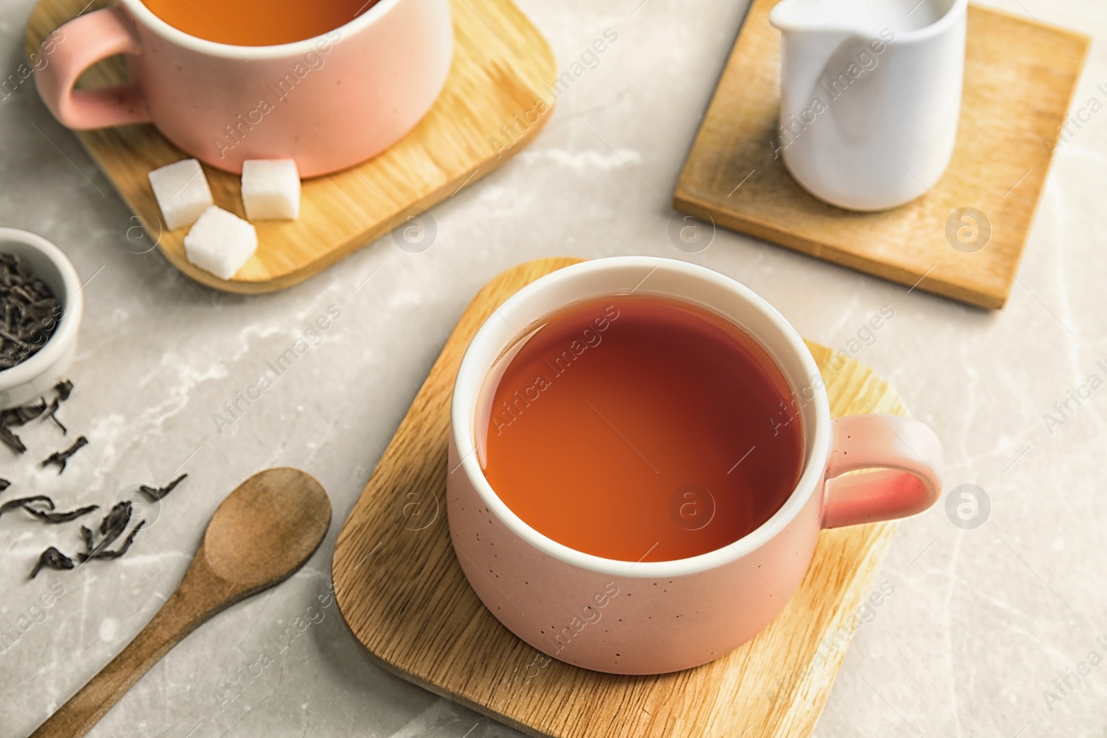 Photo of Cup of black tea on table