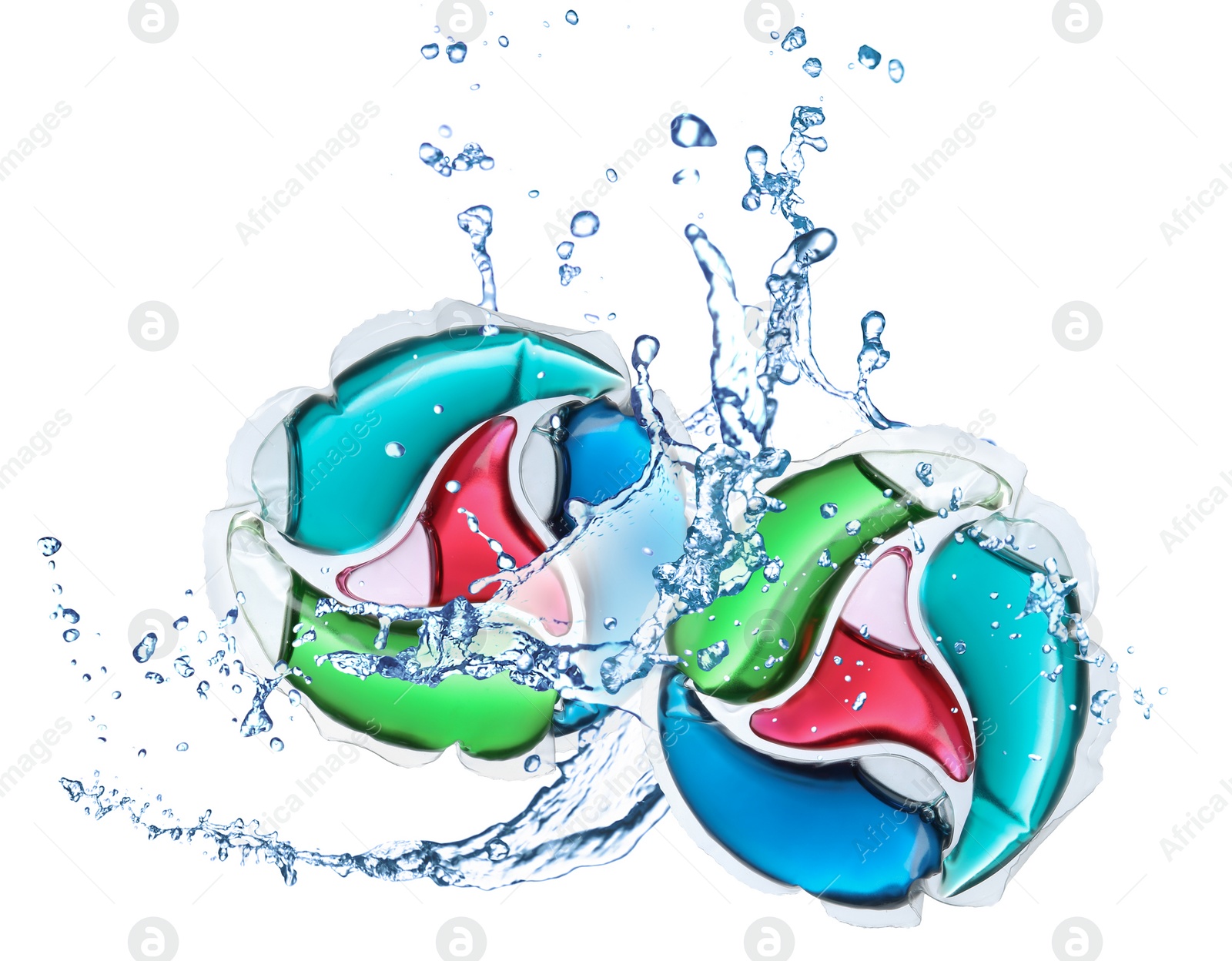 Image of Laundry capsules and splashing water on white background. Detergent pods