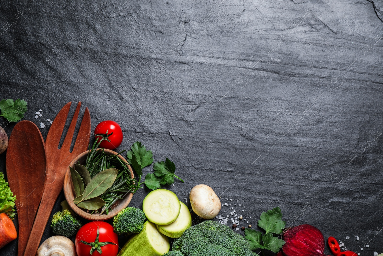 Photo of Flat lay composition with fresh products on grey table, space for text. Healthy cooking