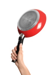 Photo of Woman holding new clean frying pan on white background