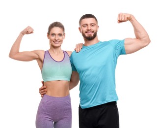 Photo of Athletic people showing muscles on white background