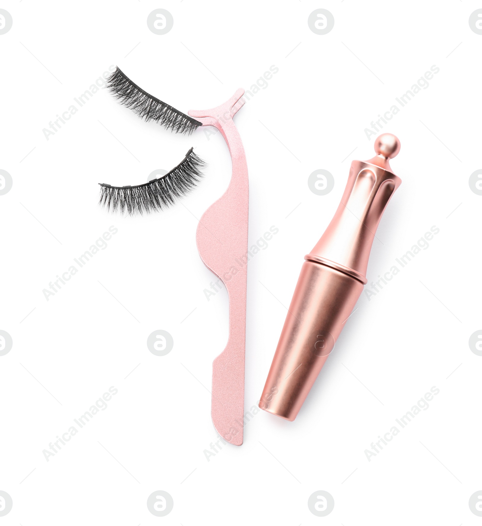 Photo of Magnetic eyelashes, eyeliner and tweezers on white background, top view