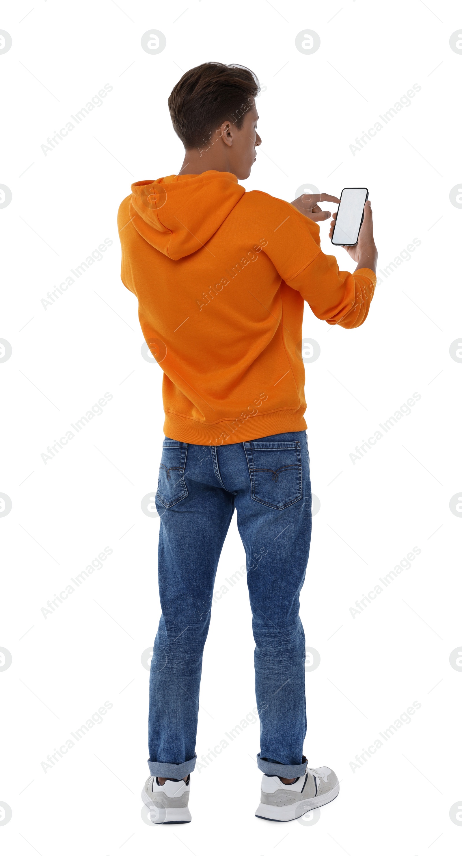 Photo of Man using phone with blank screen on white background, back view