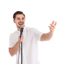 Photo of Young handsome man singing in microphone on white background