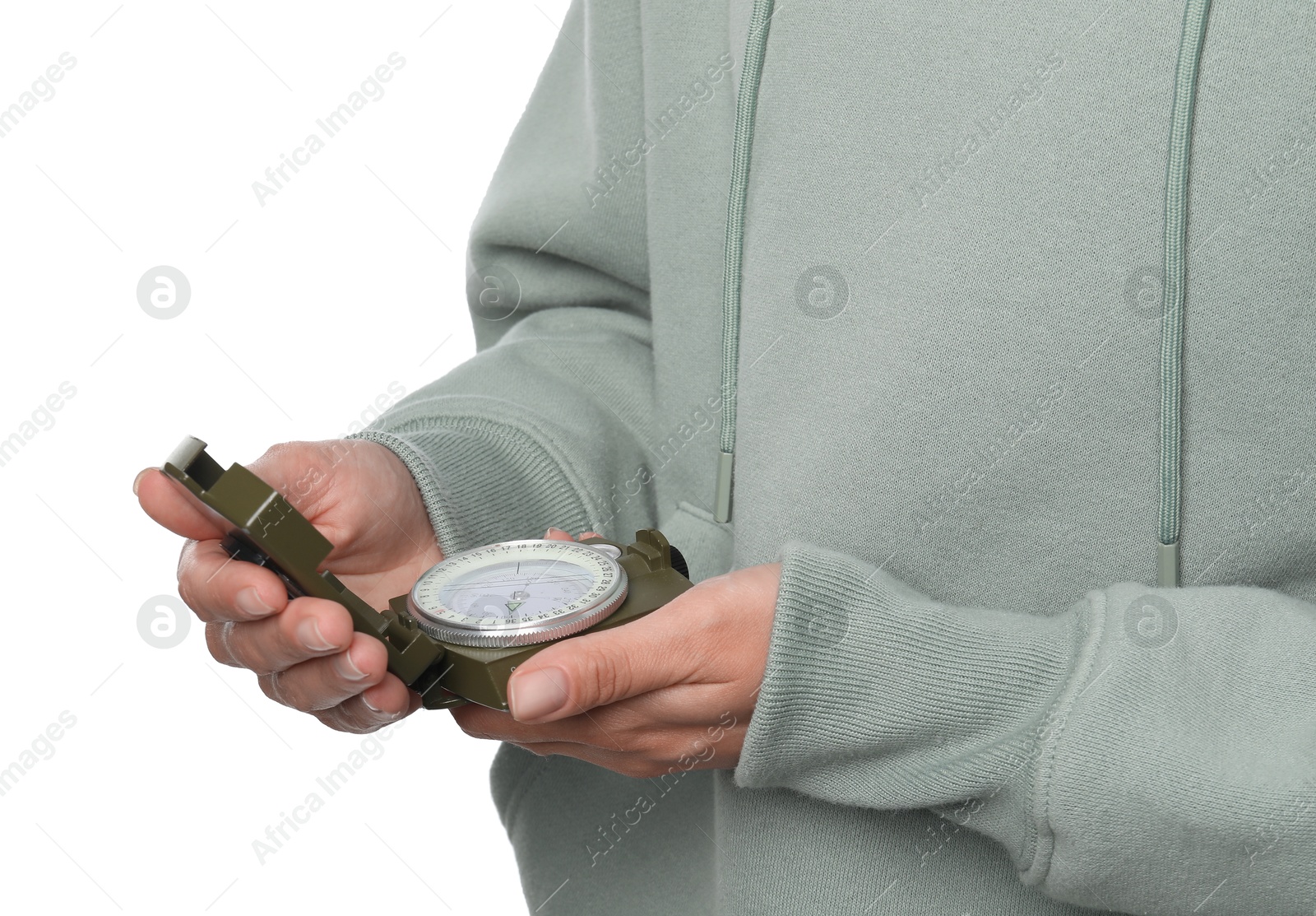 Photo of Woman holding compass on white background, closeup