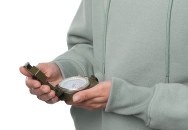 Photo of Woman holding compass on white background, closeup