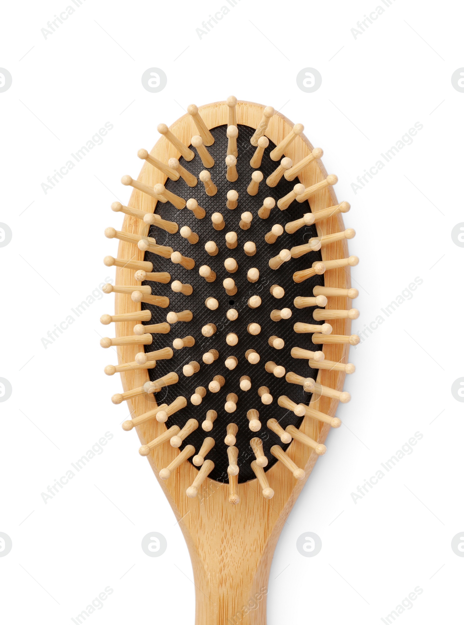 Photo of New wooden hair brush isolated on white, top view