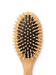 New wooden hair brush isolated on white, top view