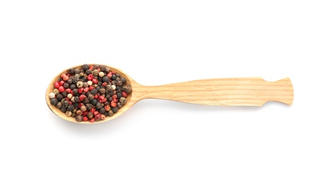 Photo of Wooden spoon with different pepper grains on white background, top view