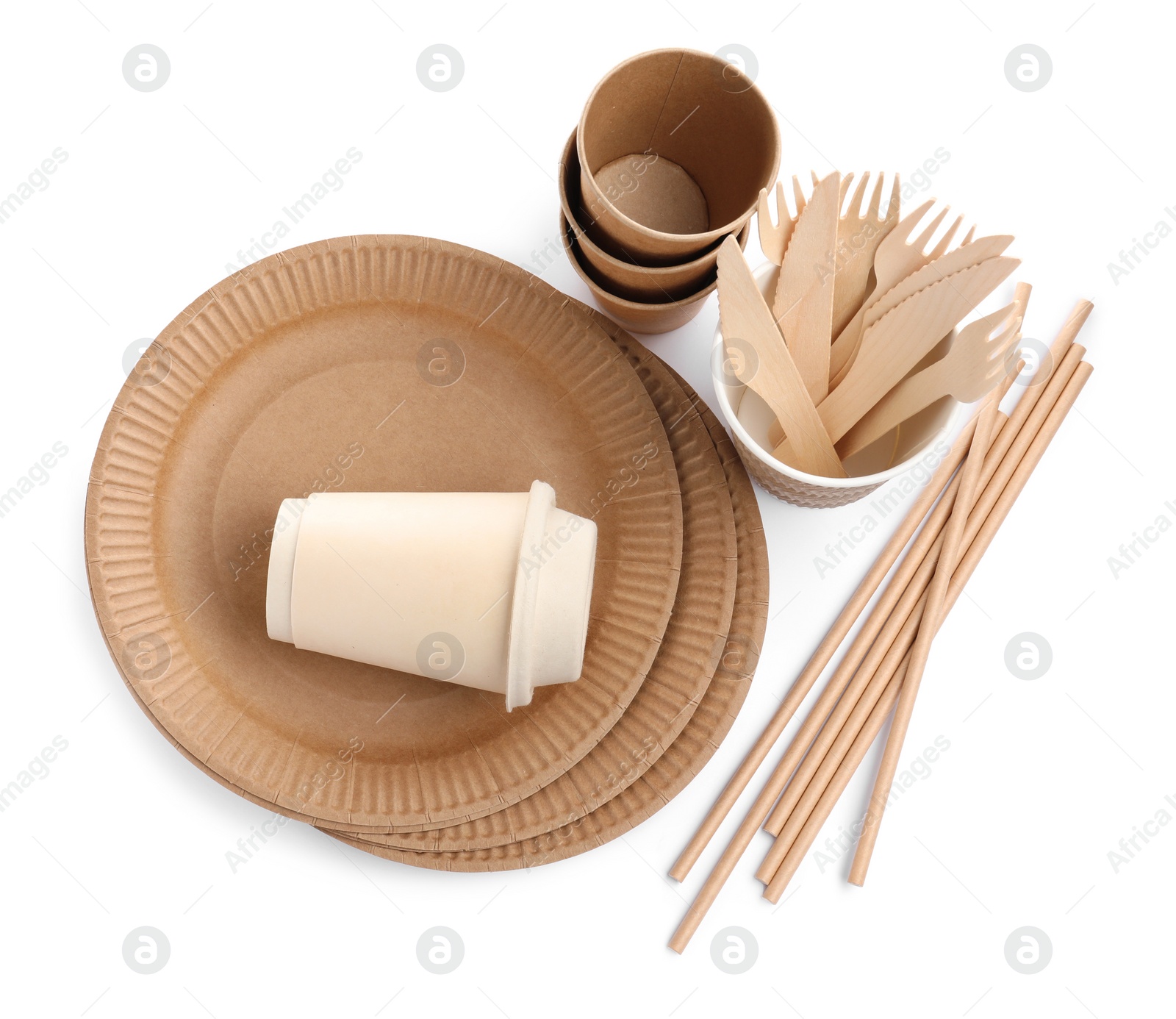 Photo of Set of disposable tableware on white background, top view