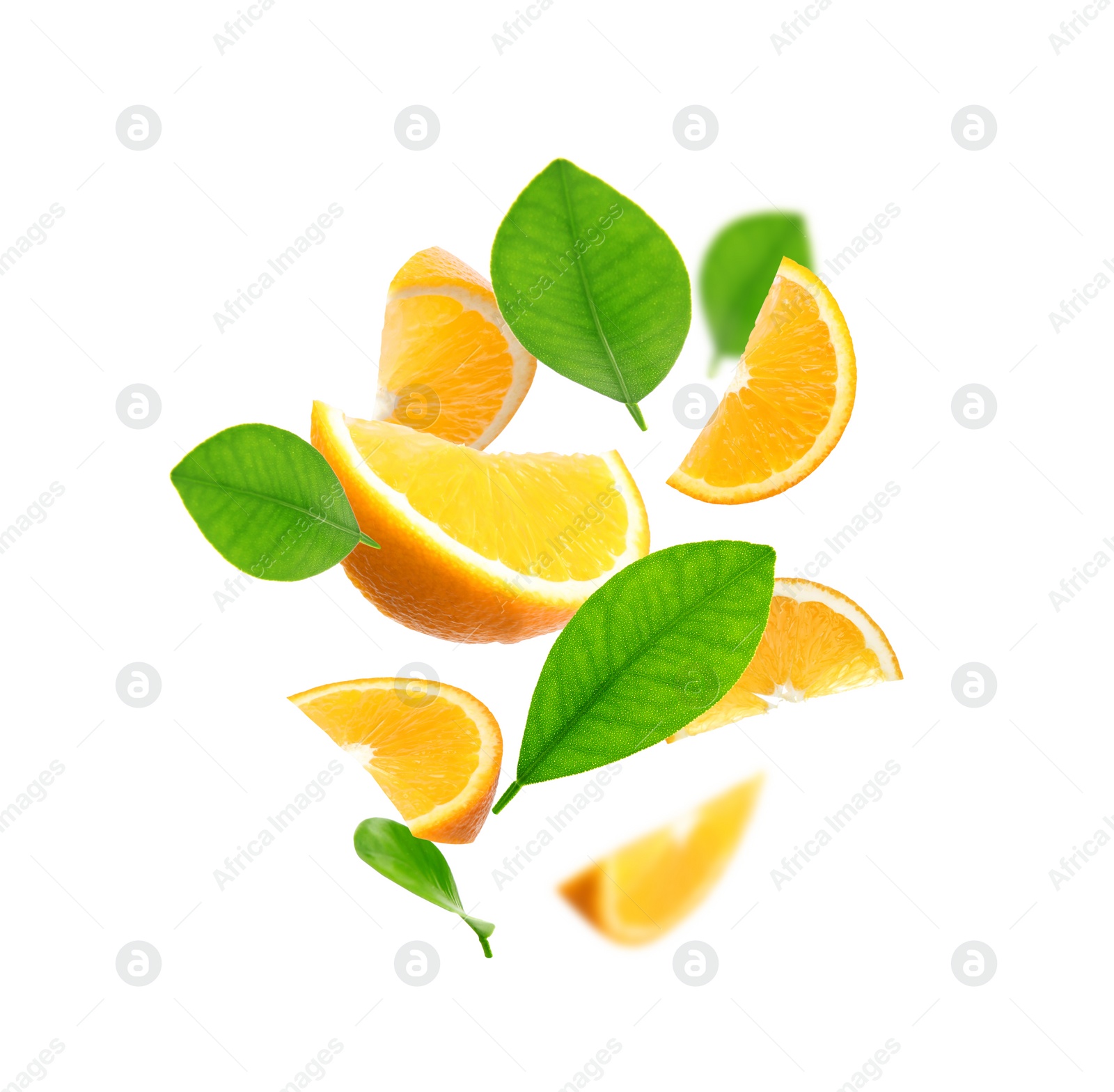 Image of Juicy orange slices and green leaves flying on white background