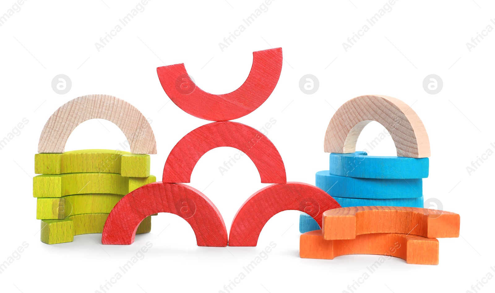 Photo of Colorful wooden pieces of play set isolated on white. Educational toy for motor skills development