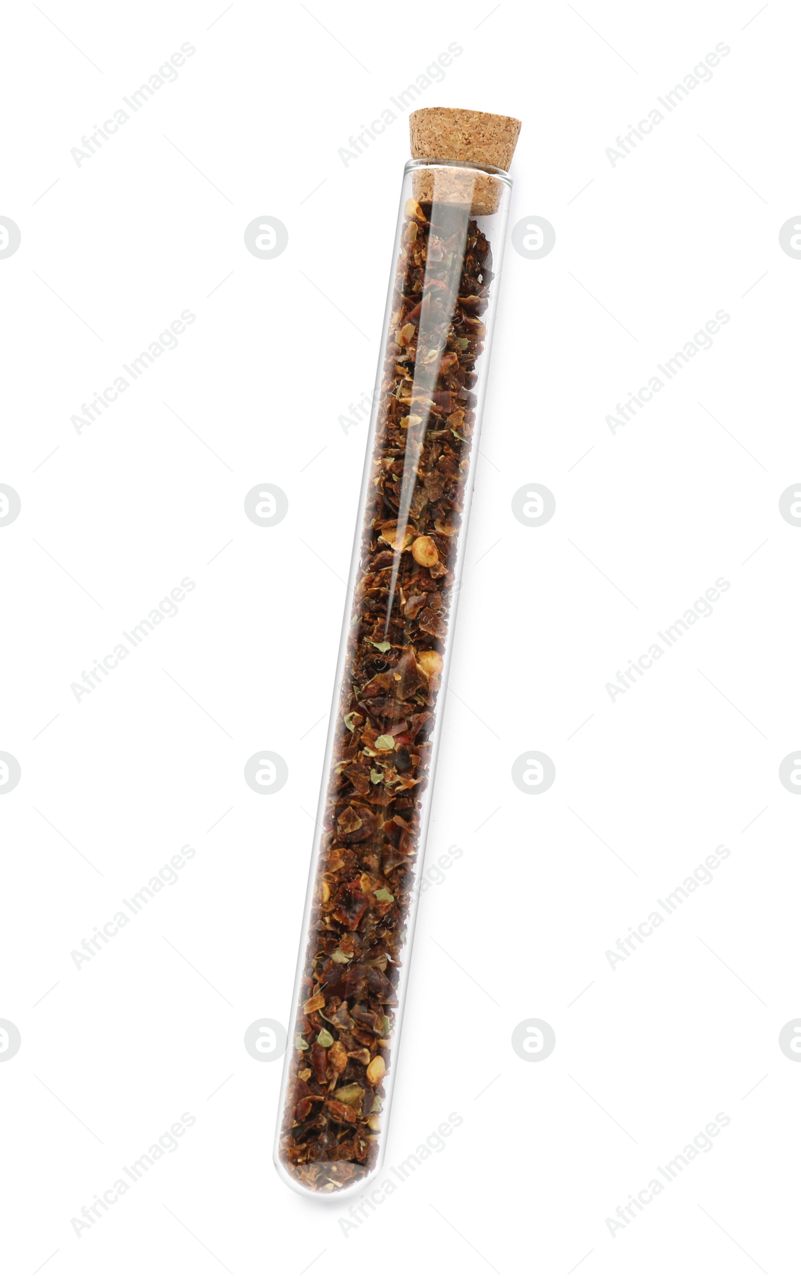 Photo of Glass tube with ground chilli pepper on white background, top view