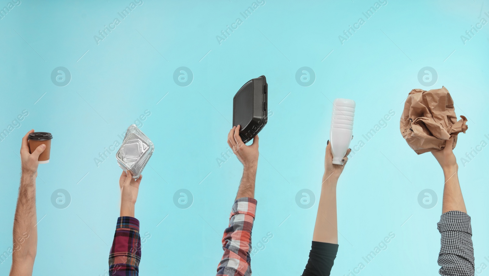 Photo of People holding different garbage on color background. Waste recycling concept