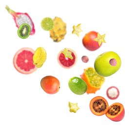 Image of Different tasty exotic fruits flying on white background