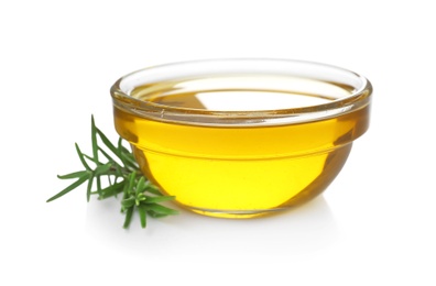 Photo of Bowl with rosemary oil on white background