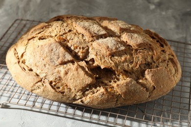 Freshly baked sourdough bread on grey table