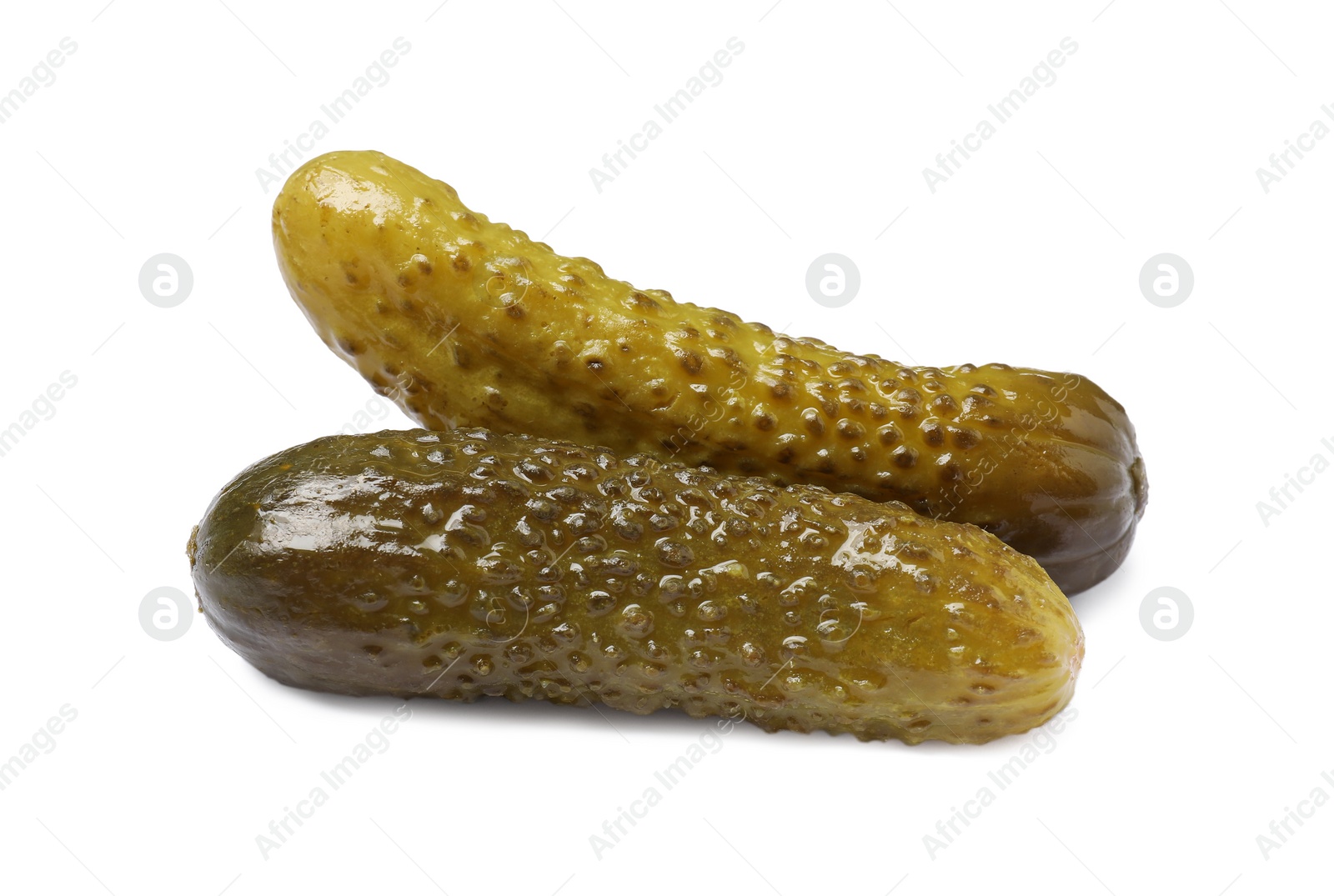 Photo of Two tasty pickled cucumbers isolated on white