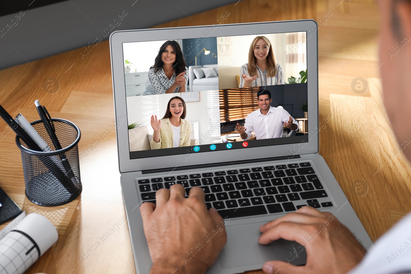 Image of Coworkers working together online. Man using video chat on laptop, closeup