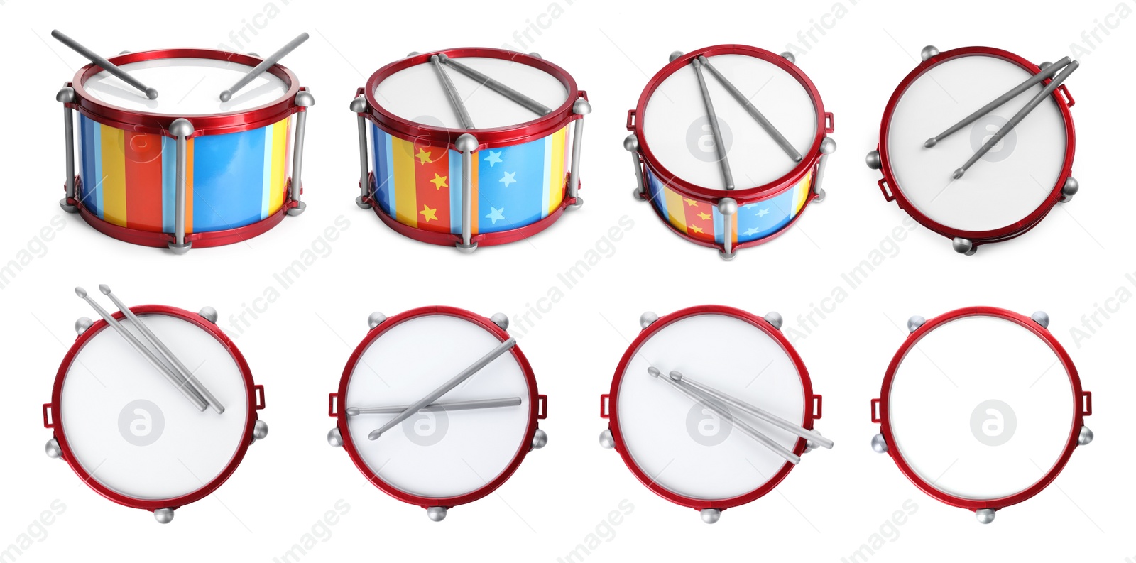 Image of Bright toy drums and sticks on white background, set