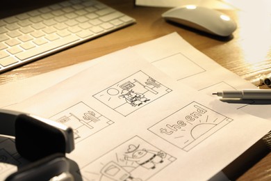 Photo of Storyboard with cartoon sketches at workplace. 	
Pre-production process