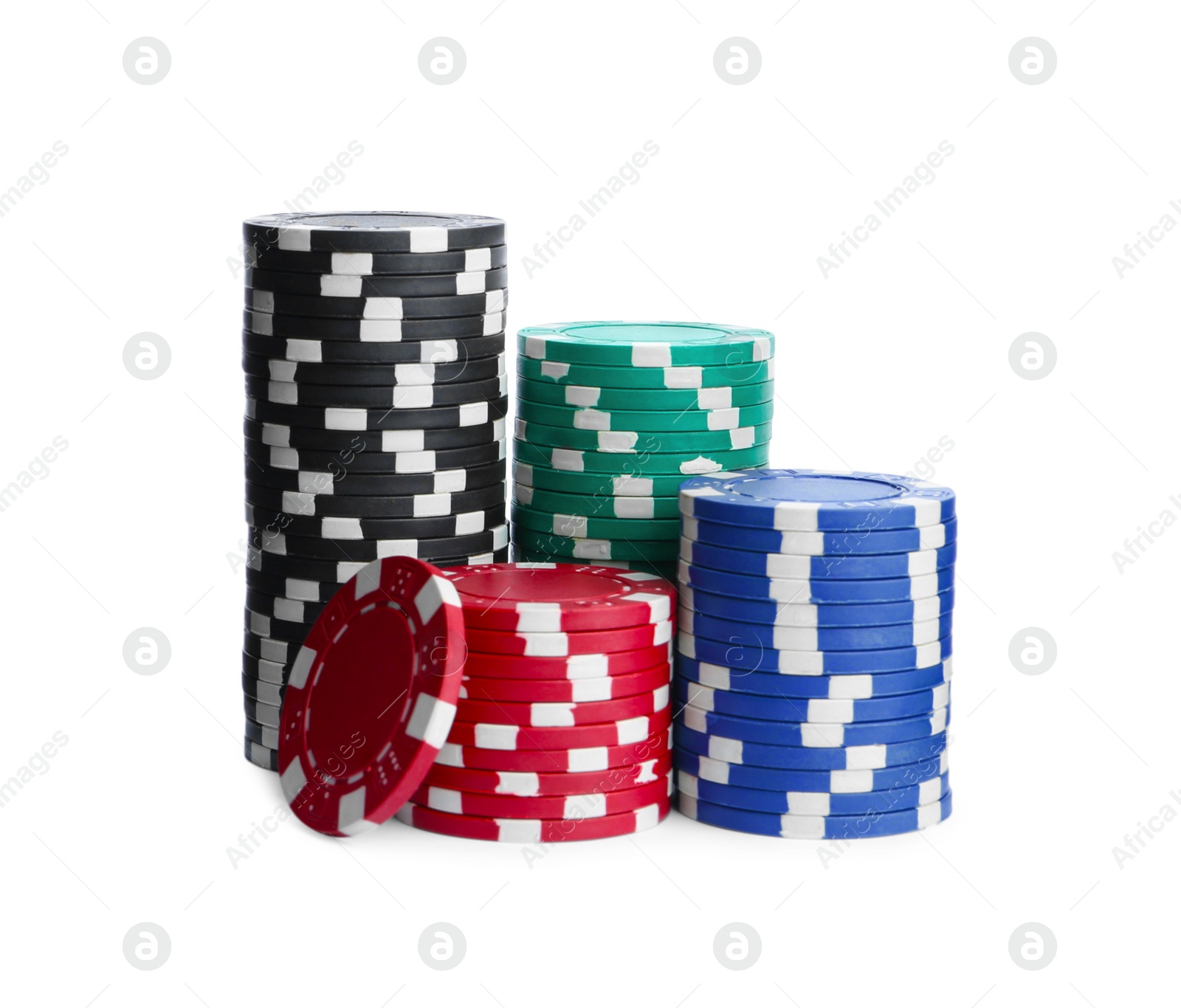 Photo of Plastic casino chips stacked on white background. Poker game