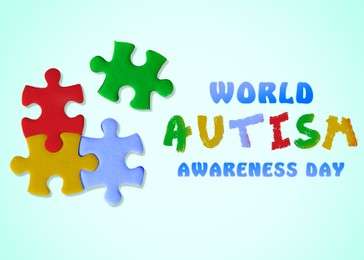 Image of World Autism Awareness Day. Colorful puzzle pieces and text on light blue background, top view
