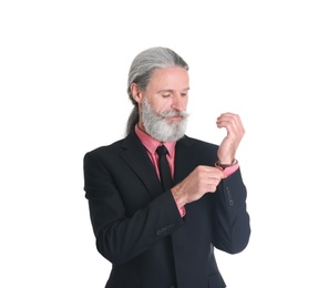 Photo of Handsome bearded mature man in suit on white background