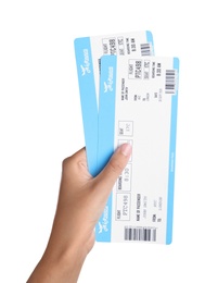 Woman holding tickets on white background, closeup. Travel agency concept